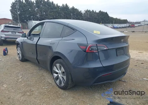 2022 Tesla Model Y Long Range Dual Motor All-Wheel Drive z USA, uszkodzony, nr VIN 7SAYGDEE2NA018857